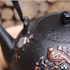 Black cast iron teapot decorated 1300 ml