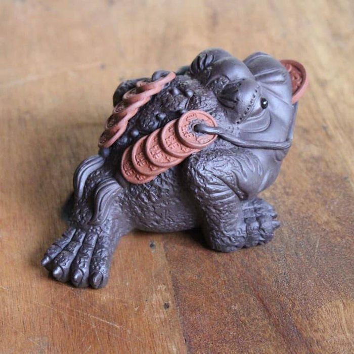 Toad tea figurine with ceramic coin